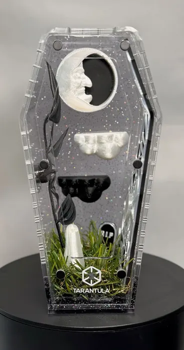 Coffin enclosure with a crescent moon and mushrooms