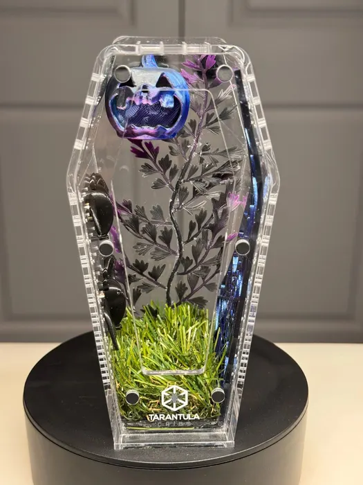 Purple coffin enclosure with black flowers