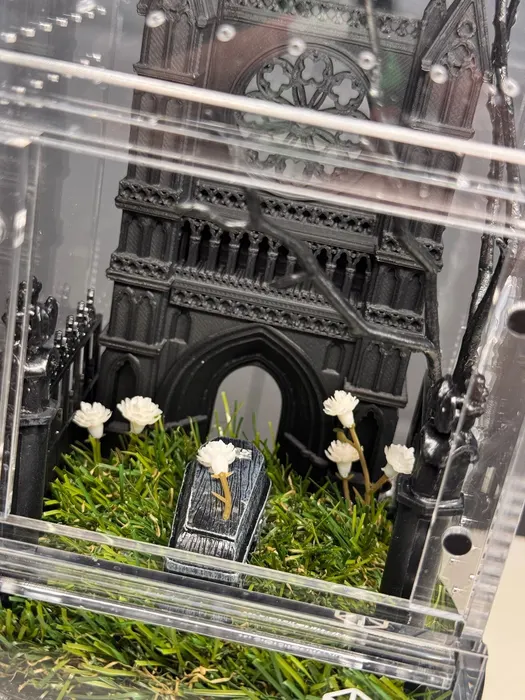Gothic cathedral enclosure with white roses