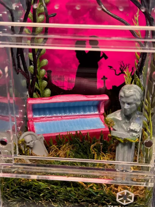 Silhouette couple enclosure with a pink backdrop