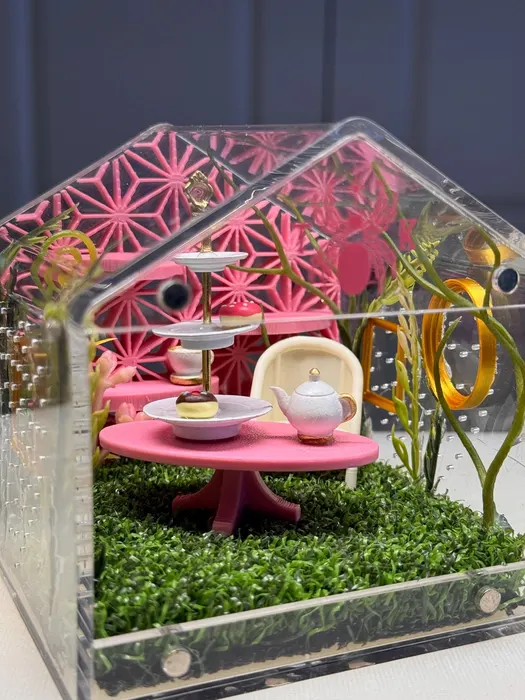 Pink tea party enclosure with a pink table