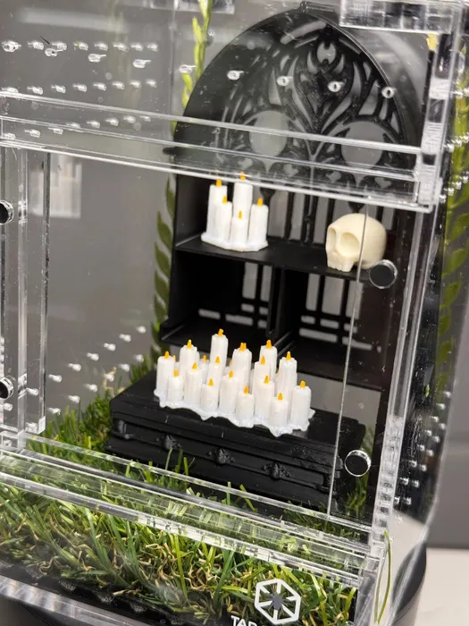 Enclosure with candles and a black lantern