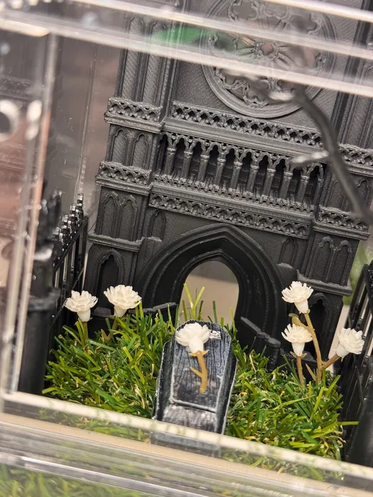Gothic cathedral enclosure with white roses