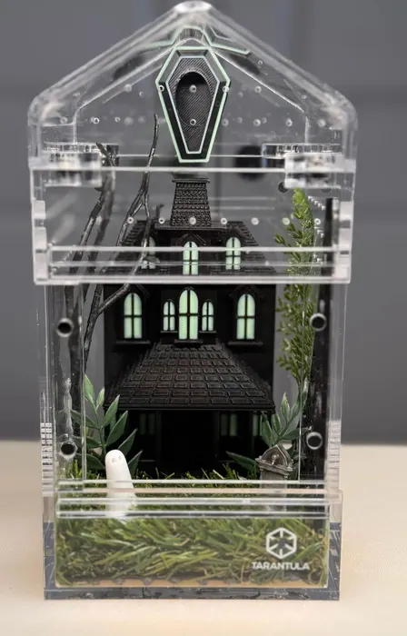 House enclosure with a black mansion and ghost