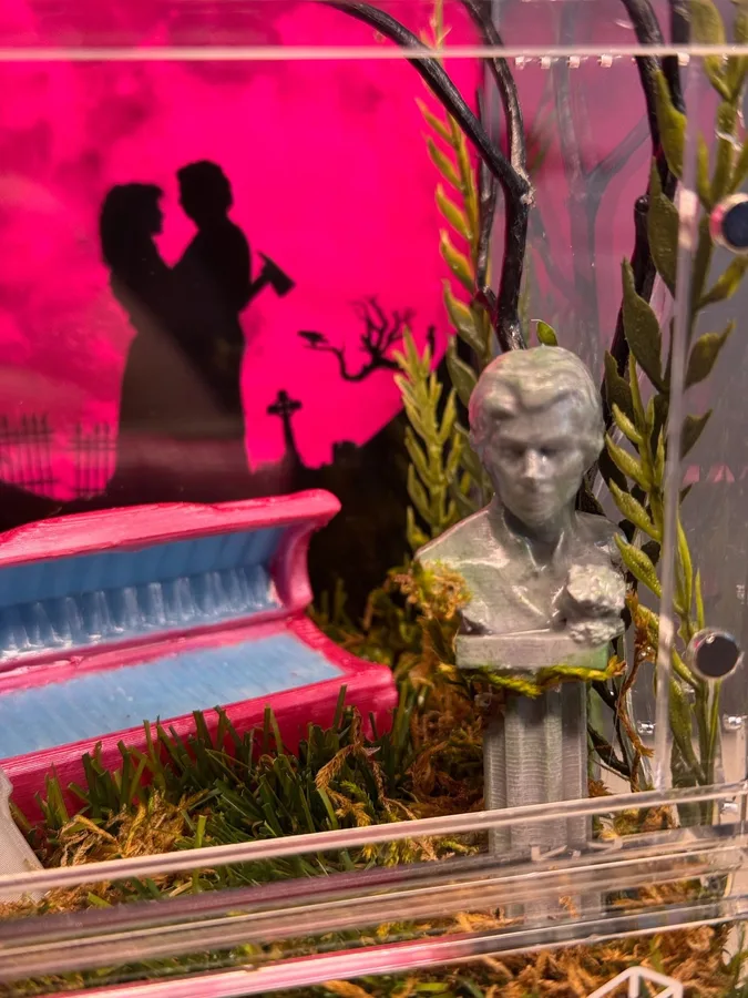 Silhouette couple enclosure with pink backdrop